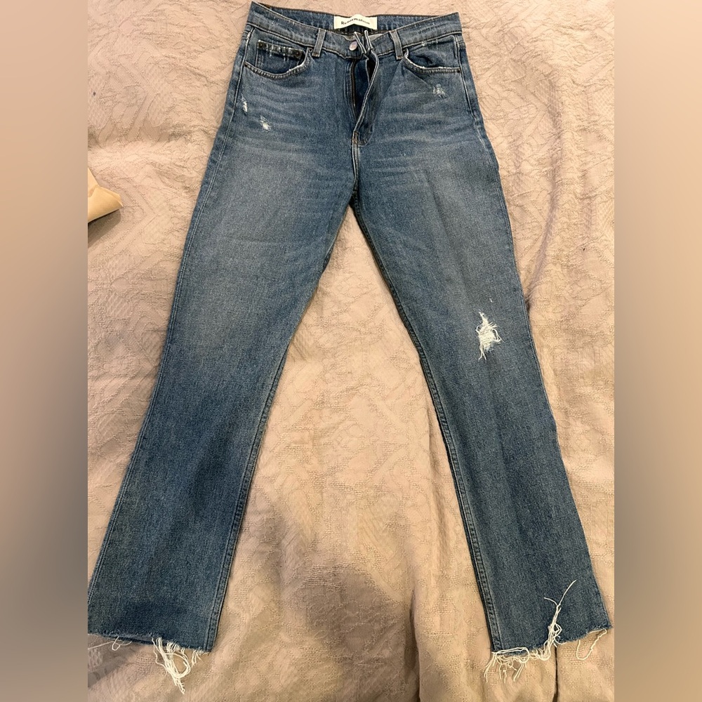 Distressed Blue Jeans